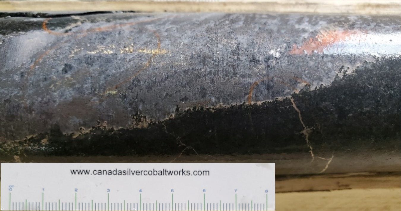 Figure 1: Close-up of mineralization in hole CS-21-61 (30,416.91 g/tonne Ag). One can see the intense Cobalt mineralization occurring as the dark grey minerals within the vein. The bright silver is located within the cobalt clusters as well as lining the edge of the vein and radiating outwards.